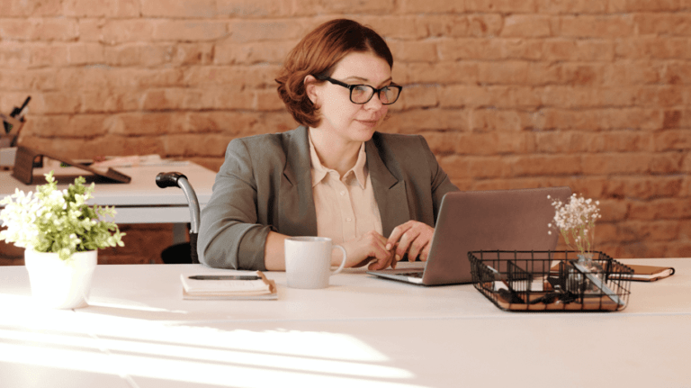 How to get started with digital products. An entrepreneur working on a laptop, creating and selling digital products. The screen displays a digital product dashboard, representing online business growth and passive income opportunities.